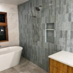 Wall tiles installed in the bathroom – creating a sleek and modern look.