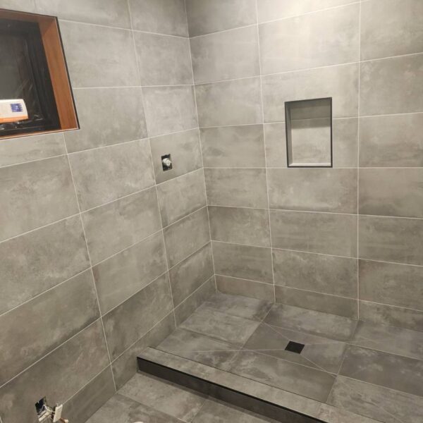 Bathroom fully tiled – a sleek, modern look with high-quality tile finishes.
